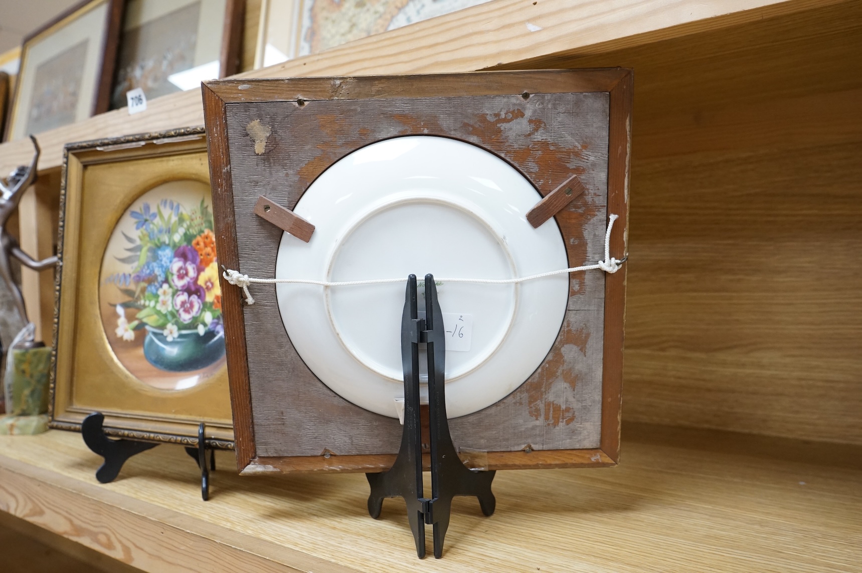 A pair of Noritake floral plates, signed S. Tokohashi, frames in gilt mounts and frames, plates 18.5cm diameter.